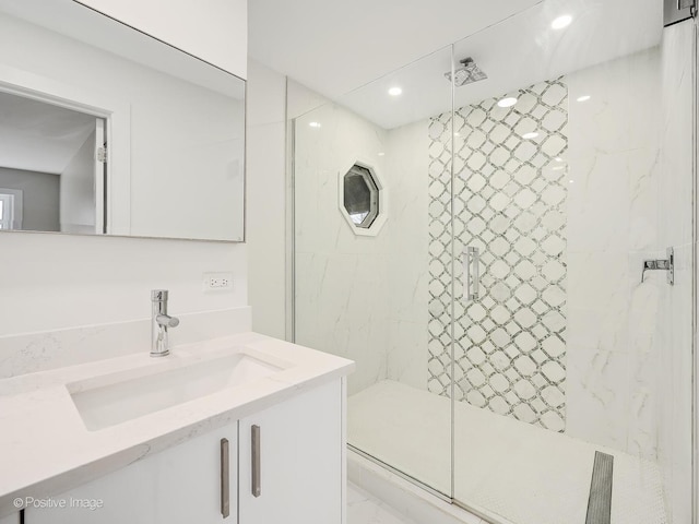 full bathroom featuring a shower stall, vanity, recessed lighting, and marble finish floor