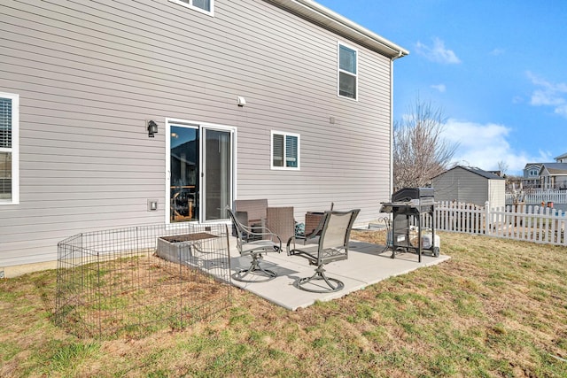 851 Western Ave, Braidwood, IL 60408 - back of property with a yard, a patio area, and fence
