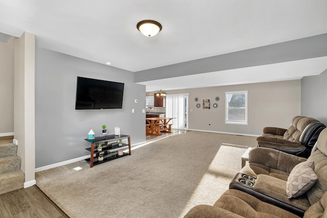 851 Western Ave, Braidwood, IL 60408 - living room with an inviting chandelier, carpet flooring, and baseboards