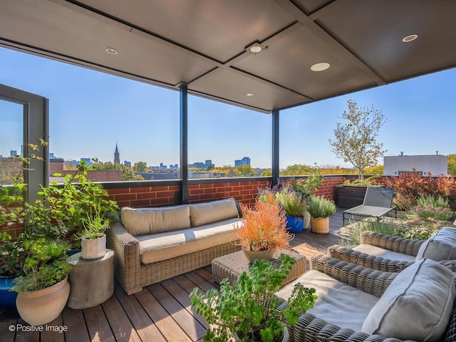 wooden terrace featuring an outdoor living space