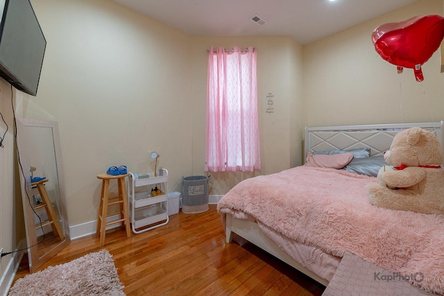 bedroom featuring light hardwood / wood-style floors