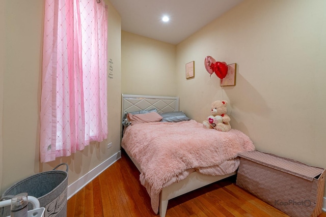 bedroom featuring hardwood / wood-style flooring