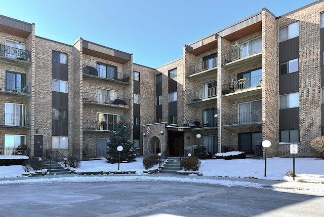 view of snow covered property