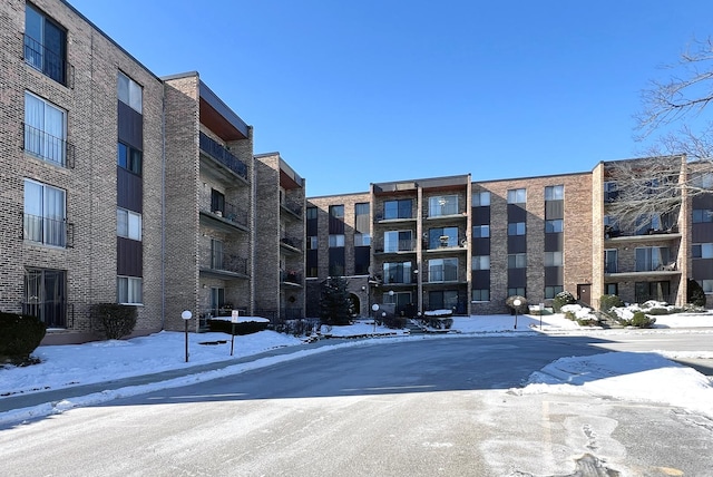 view of snow covered property