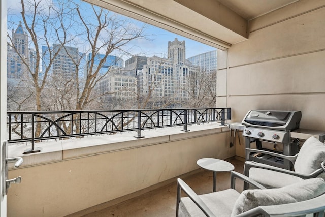 balcony featuring a grill and a city view