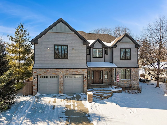 view of front facade with stone siding, board and batten siding, and an attached garage