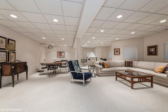 living room featuring recessed lighting, baseboards, and carpet