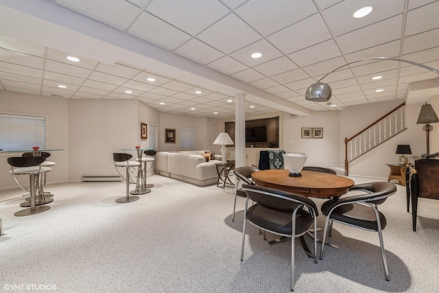 carpeted dining space with stairway, recessed lighting, baseboard heating, and baseboards