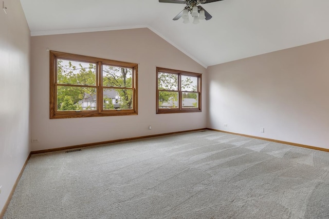 1185 Surrey Ln, Itasca, IL 60143 - spare room with a ceiling fan, lofted ceiling, baseboards, and light carpet