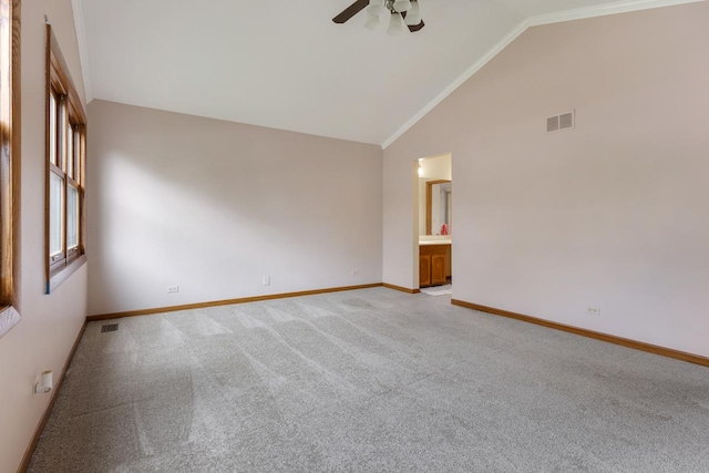 1185 Surrey Ln, Itasca, IL 60143 - spare room featuring a ceiling fan, light colored carpet, baseboards, and high vaulted ceiling