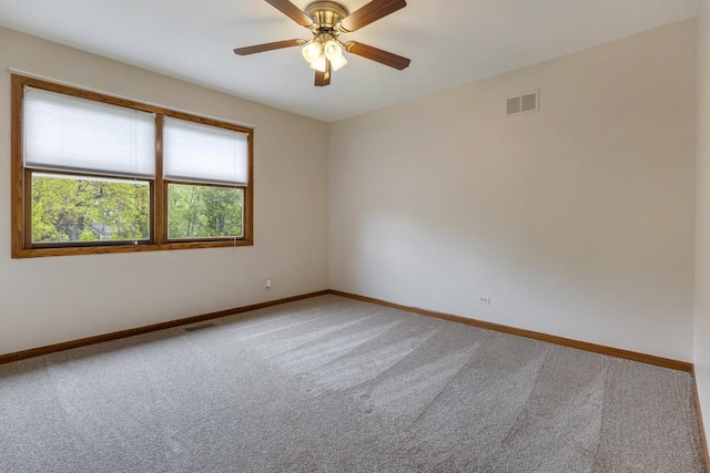 1185 Surrey Ln, Itasca, IL 60143 - empty room featuring carpet floors, baseboards, and ceiling fan