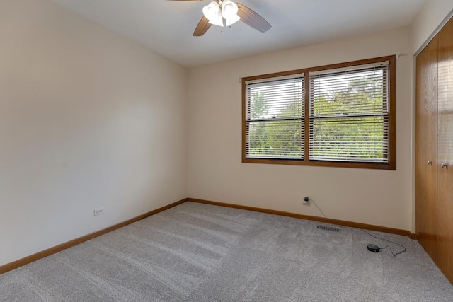 1185 Surrey Ln, Itasca, IL 60143 - carpeted empty room featuring ceiling fan and baseboards