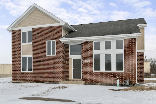 traditional-style house with brick siding