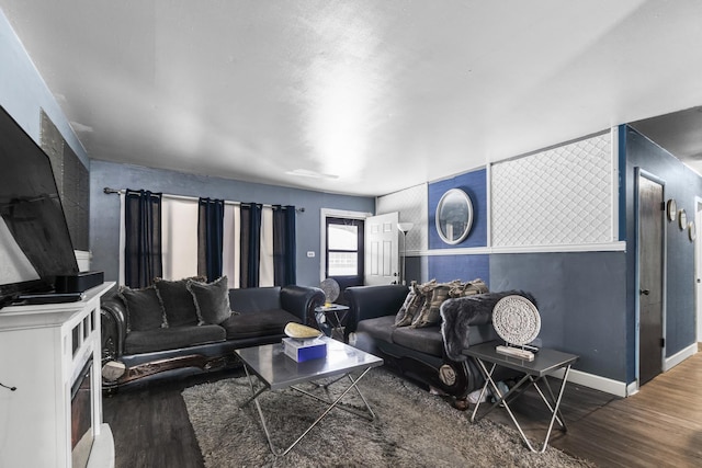 living room with dark wood-type flooring