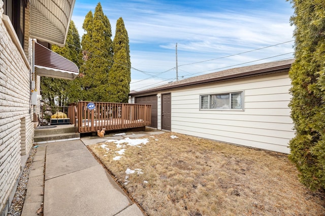 view of home's exterior with a deck