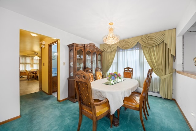 carpeted dining room featuring a notable chandelier and baseboards