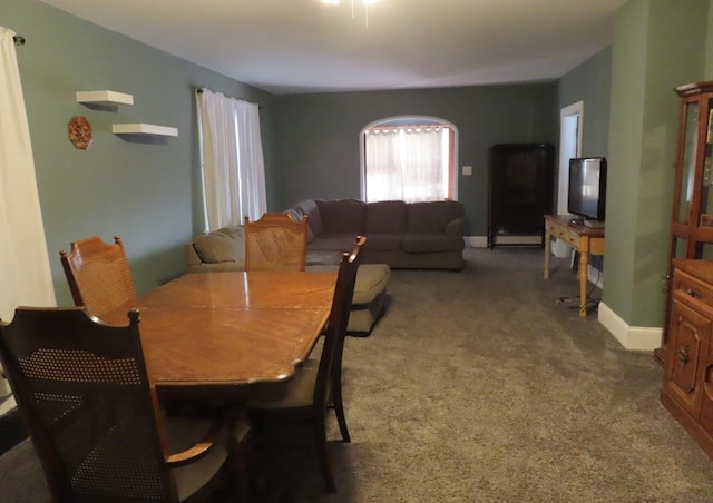 dining room featuring carpet flooring