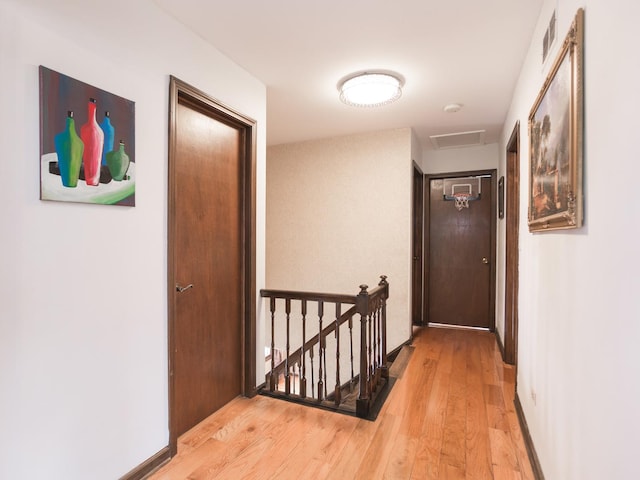 hallway featuring light wood-type flooring