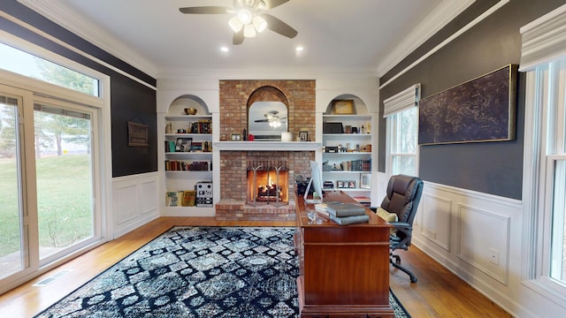 7N108 Hastings Dr, Saint Charles, IL 60175 - home office with ceiling fan, wood finished floors, built in features, ornamental molding, and a brick fireplace