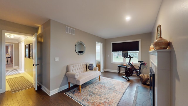 7N108 Hastings Dr, Saint Charles, IL 60175 - living area with dark wood finished floors, baseboards, and a fireplace with flush hearth