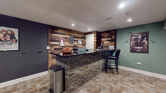 7N108 Hastings Dr, Saint Charles, IL 60175 - bar area with light stone finish flooring, baseboards, and recessed lighting