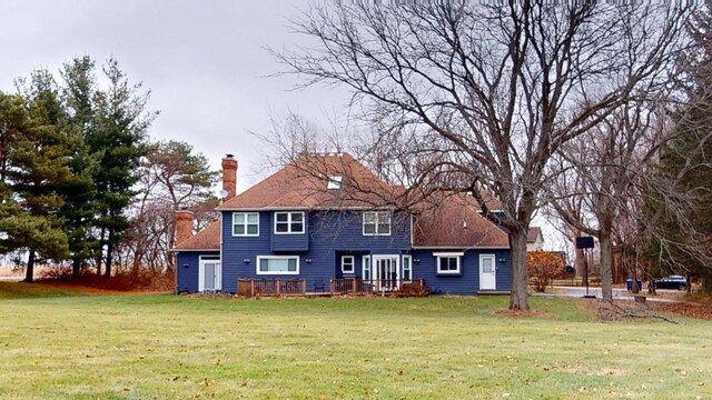 7N108 Hastings Dr, Saint Charles, IL 60175 - rear view of house featuring a chimney and a yard