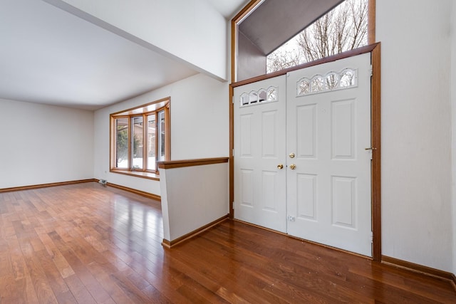 entrance foyer with hardwood / wood-style floors