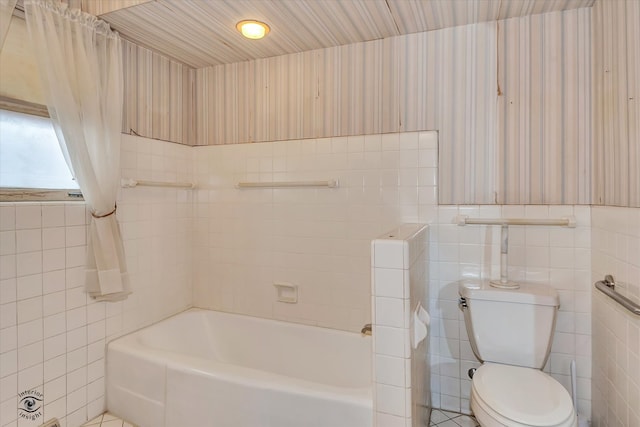 full bath with toilet, walk in shower, a bath, and tile walls