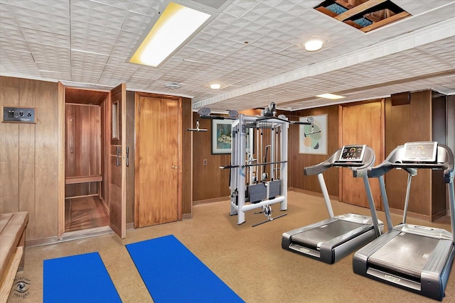 workout room with wooden walls