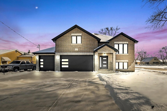 view of front of home with a garage