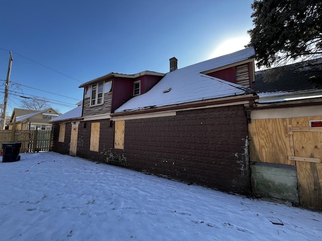 view of snow covered property