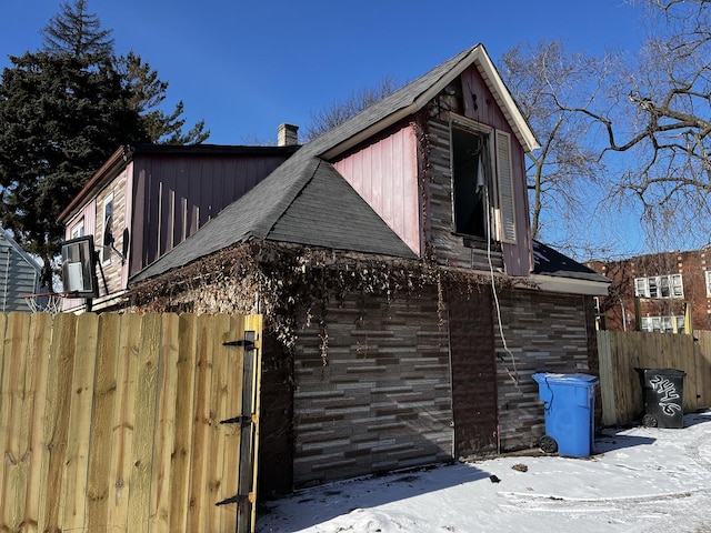 view of snow covered property