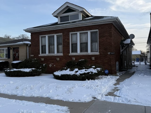 view of snow covered property