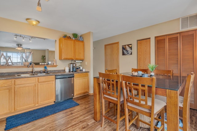 kitchen with light hardwood / wood-style flooring, sink, ceiling fan, stainless steel dishwasher, and light brown cabinets