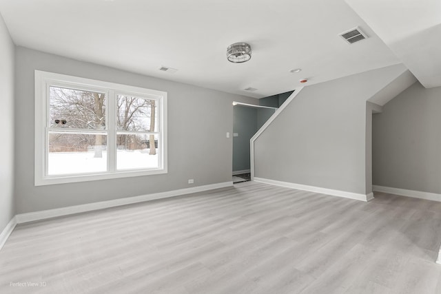 unfurnished living room with light wood-type flooring