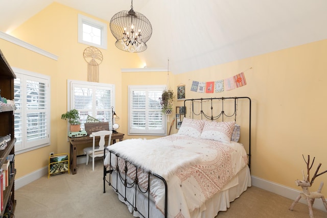 carpeted bedroom with a chandelier and a high ceiling