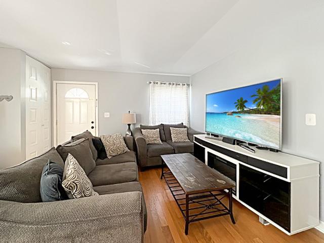 living area with wood finished floors