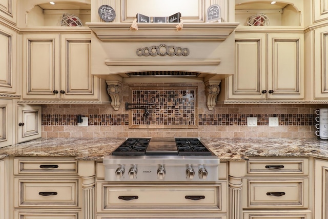 kitchen featuring cream cabinets and stainless steel gas cooktop