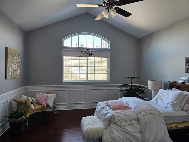 bedroom featuring lofted ceiling, dark hardwood / wood-style floors, and ceiling fan