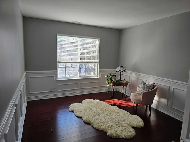 living area featuring dark hardwood / wood-style floors