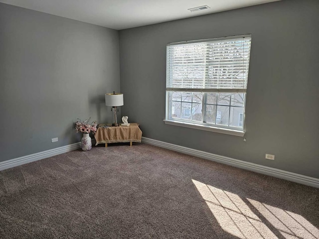 unfurnished room featuring carpet floors