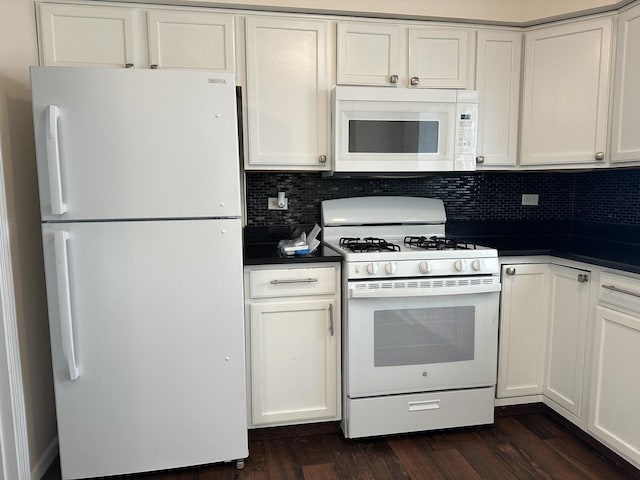 kitchen with white cabinetry, white appliances, and dark wood-type flooring