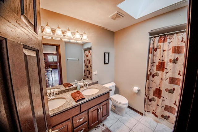 full bathroom featuring tile patterned flooring, visible vents, toilet, and a sink