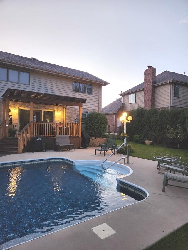 outdoor pool featuring a patio area