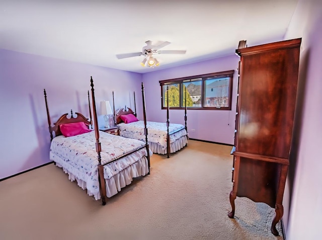 bedroom with light colored carpet and ceiling fan