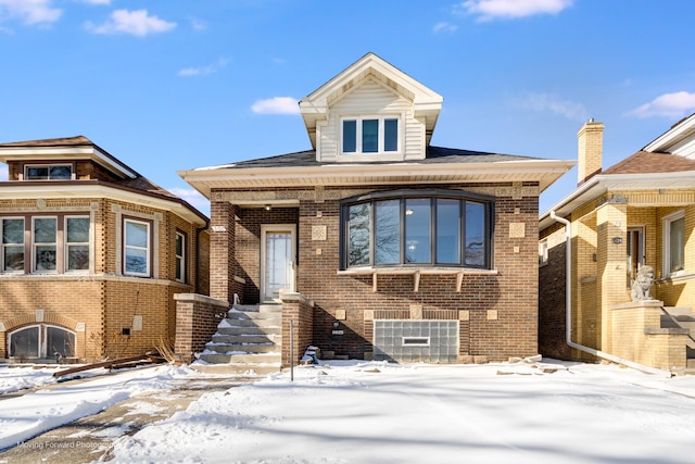 view of front of property featuring brick siding