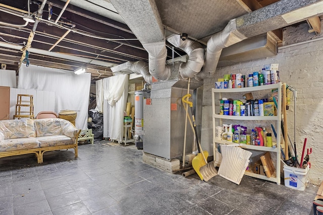 unfinished basement with water heater, concrete block wall, and heating unit