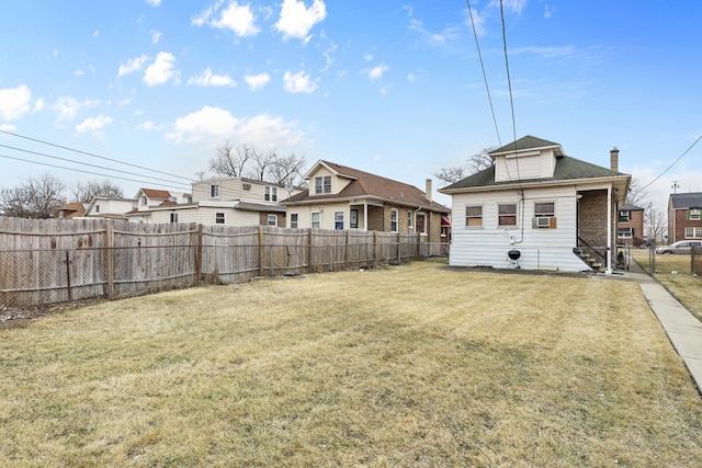 view of yard featuring a fenced backyard