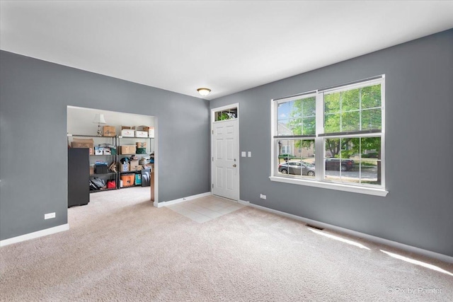 interior space with visible vents and baseboards