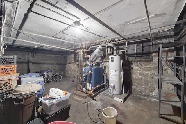 unfinished basement with gas water heater and a heating unit